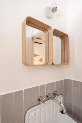 a bathroom with a mirror above a sink at Casa Chiagio in Rome