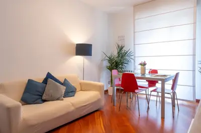 a living room with a couch and a table at Apartment Casa Girina Boutique in Rome