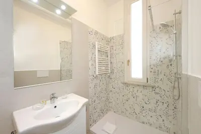 a bathroom with a sink and a shower at Carlo Felice in Rome