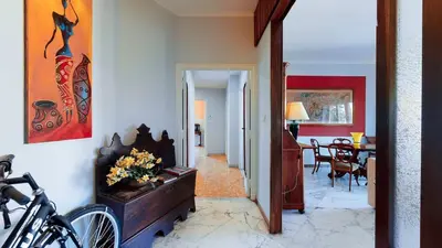 a hallway leading to a living room and a dining room at FIORELLA's TERRACE in Rome