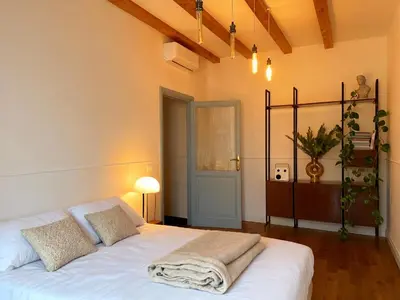 a bedroom with a bed with a blanket on it at Monti Mood Design Apt - via Urbana - BRAND NEW in Rome