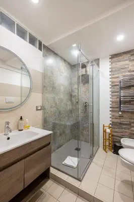a bathroom with a shower and a sink at Casa Vacanza trastevere in Rome