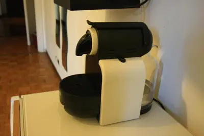 a coffee maker sitting on top of a counter at B&B Viale Dei Colli Portuensi 589 in Rome