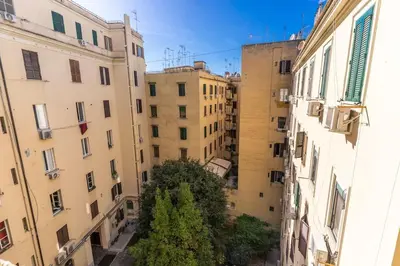 an alley between two buildings in a city at Porta maggiore 2 bedroom with terrace in Rome