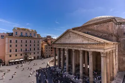 a group of people walking in front of a building at AGH Pantheon in Rome