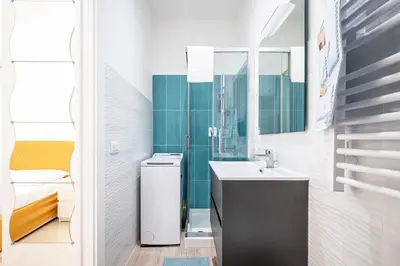 a bathroom with a sink and a shower at Il Pianoforte di Teresa - appartamento a Monteverde in Rome