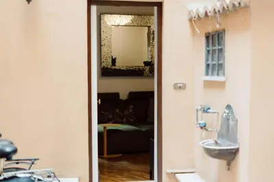 a bathroom with a sink and a mirror at The Oasis of Trastevere in Rome