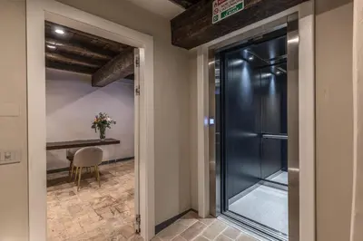 a glass door leading into a dining room with a table at Madonna del Pantheon in Rome
