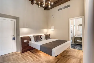 a bedroom with a large bed in a room at Madonna del Pantheon in Rome