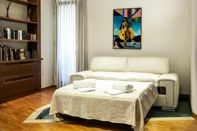a living room with a couch and a table at Callimaco Domus in Rome