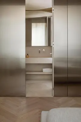 a bathroom with a mirror and a sink at Hotel Trame in Rome