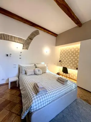 a bedroom with a large bed in a room at Salotto34 in Rome