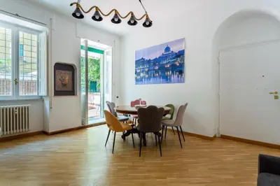 a dining room with a table and chairs at Residenza Prati in Rome