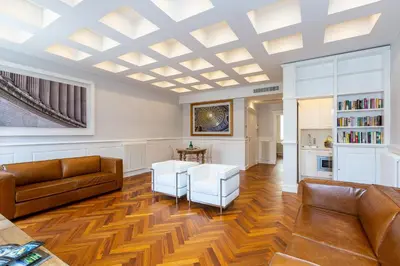 a living room with a couch and a table at Amazing Vittoriano in Rome