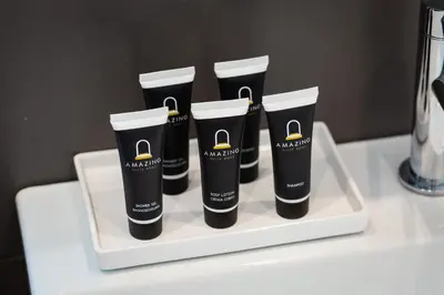 a group of four tubes of mascara on a white tray at Amazing Vittoriano in Rome