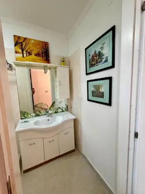 a bathroom with a sink and a mirror at Cosmo Terzo GuestHouse Roma in Rome