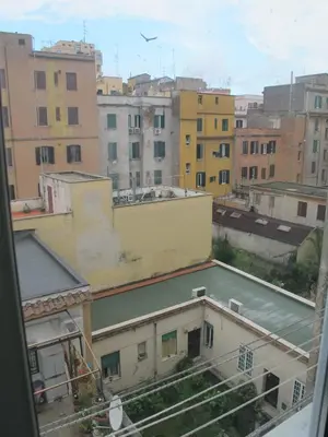 a view from a window of a city with buildings at GattaGuest in Rome
