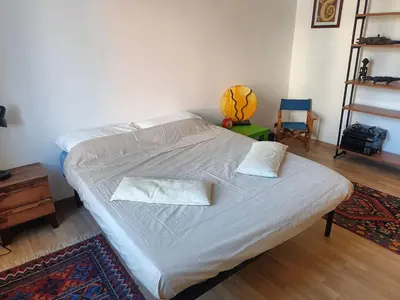 a bed with two pillows on it in a room at GattaGuest in Rome