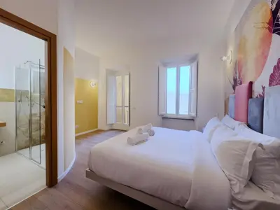 a bathroom with a sink and a shower at Santamaura Vacanze Vaticane Elegance e Comfort in Rome