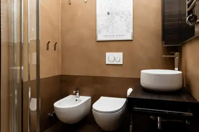 a bathroom with a toilet and a sink at Andy Home in Rome