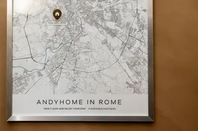 a map of andrew home in rome on a wall at Andy Home in Rome