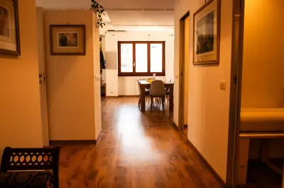 a hallway with a dining room and a table at Domus Piscariae in Rome