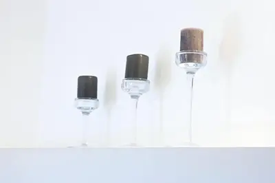 a group of three wine glasses on a shelf at Casa Bellezza a Cola di Rienzo in Centro in Rome