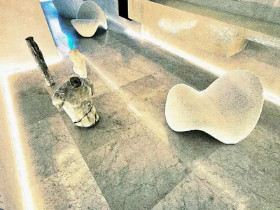 a heart shaped object on the floor of a bathroom at DUNE at Spanish Steps Luxury Apartment-Suite in Rome