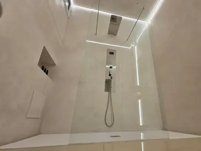 a bathroom with a shower with a phone in it at DUNE at Spanish Steps Luxury Apartment-Suite in Rome
