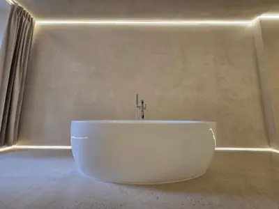 a bathroom with a white tub in a room at DUNE at Spanish Steps Luxury Apartment-Suite in Rome