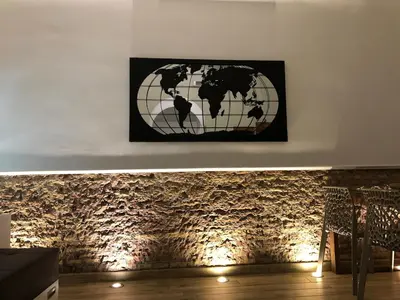 a picture of a world on a wall at Rome's heart in Rome