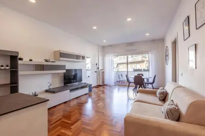 a living room with a couch and a table at Vatican Hills Apartment in Rome