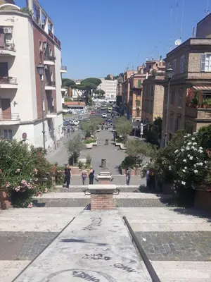 a view of a street with people walking down the street at Appartamento Delle Grazie in Rome