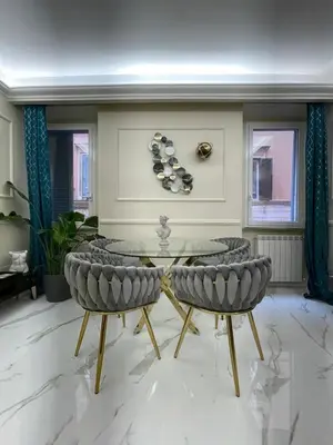 a dining room with a table and two chairs at The Madame Sofia - A Secret Hotel - Small Boutique Hotel & Apartments in Rome