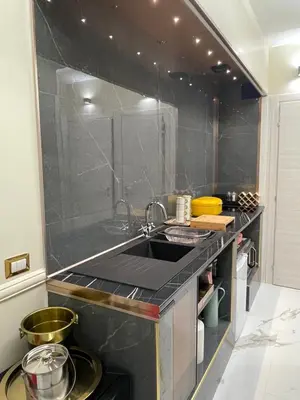 a kitchen with a sink and a counter top at The Madame Sofia - A Secret Hotel - Small Boutique Hotel & Apartments in Rome