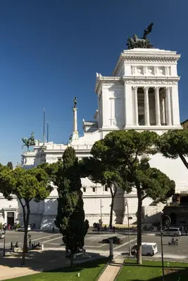 a large white building with trees in front of it at Rome Downtown Suite Bed and Breakfast Aracoeli in Rome