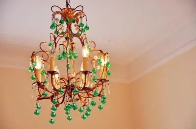 a chandelier hanging from a ceiling in a room at Casa Visconti in Rome