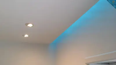 a room with two lights on the ceiling at Piccolotel in Rome