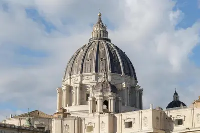 a building with a dome on top of it at 4BNB - St. Peters Dome Apartment in Rome