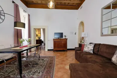 a living room with a couch and a table at Bollo in Rome