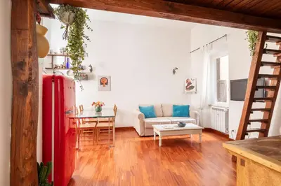 a living room with a couch and a table at A Secret Corner in Rome