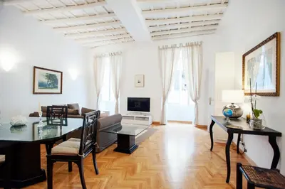 a living room with a couch and a table at S.Andrea in Rome