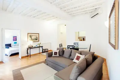 a living room with a couch and a table at S.Andrea in Rome