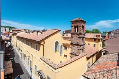 an overhead view of a city with buildings and a tower at Lungaretta3 in Rome