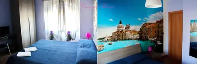a bedroom with a blue bed with a painting on the wall at La Quiete in Rome