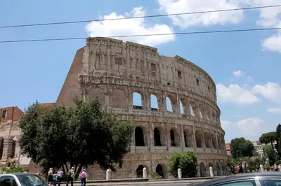 a view of the colosseum at Walk to the Colosseum from your Family Apt in Rome