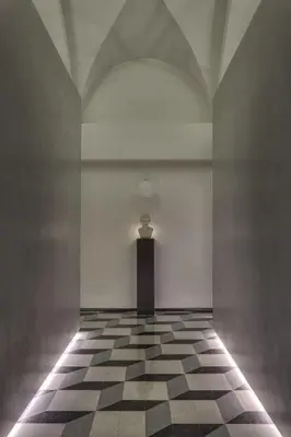 a room with a black and white checkered floor at Navona Theatre Hotel in Rome