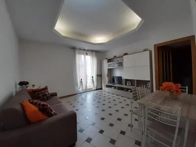 a living room with a couch and a table at FamilyBed Roma Monteverde-Vaticano in Rome