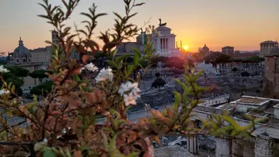 a view of the city at sunset at Residenza Maritti ContemporarySuite - Guesthouse in Rome
