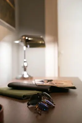 a pair of keys sitting on top of a table at Good Life Monti in Rome